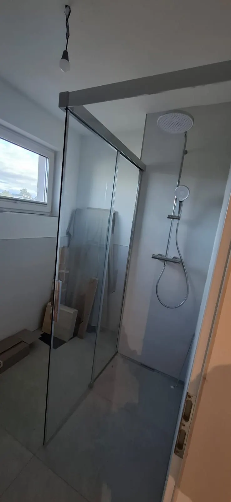 Bodengleiche Dusche mit Glaswand